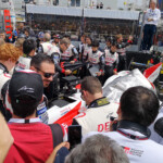 The Toyota team was swamped during the grid walk - can you spot F1 champion and team leader, Fernando Alonso?